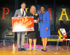 2013 PIMA winner Annette DiMaggio (center) is honored by Target’s Matt Boylan  and State Superintendent Lillian Lowery.