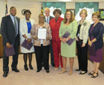 Signing the agreement, from left, Dewayne Jones, president-elect, Maryland Association of Secondary School Principals; State Superintendent Lillian Lowery; State Board President Charlene Dukes, Public School Superintendents Association President Stephen Guthrie, Baltimore Teachers Union President Marietta English, Maryland State Education Association President Betty Weller, Maryland Association of Boards of Education President Kathryn Groth, and Maryland Association of Elementary School Principals President Theresa Ball.