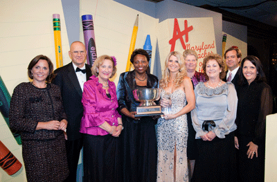 Rhonda Holmes-Blankenship become the 2013 Maryland Teacher of the Year. She is flanked by: Marisa Shockley, James Pitts, Dr. Darla Strouse, Dr. Lillian Lowery, Anne Gellrich, D’Ette Devine, John Conwell and Marie McKinney.