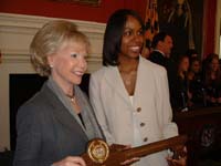 Dr. Grasmick giving Kimberly Oliver the key on May 1, 2006